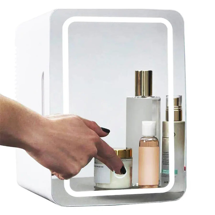 Mini makeup fridge with LED light mirror, storing beauty products.