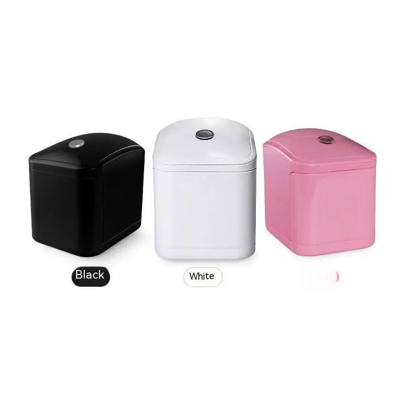 Black, white, and pink mini-portable skin tattoo printers.