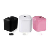 Black, white, and pink mini-portable skin tattoo printers.